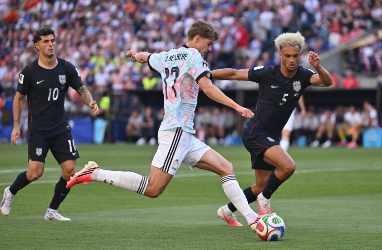 July 6, 2026; Seattle, Washington, U.S.; Belgium's Charles De Ketelaere in action with Antonee Robinson of the U.S.