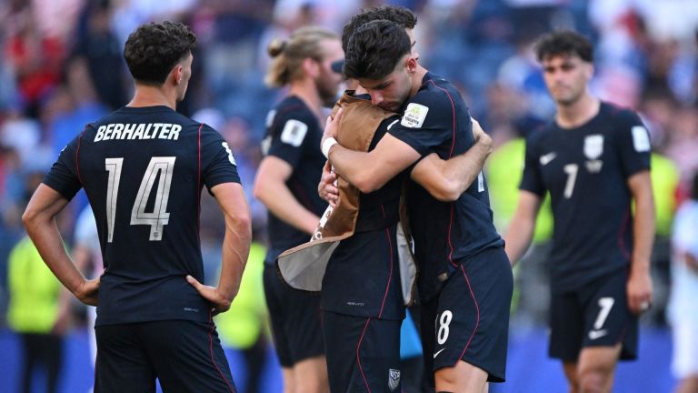 July 6, 2026; Seattle, Washington, U.S.; Christian Pulisic and Max Arfsten of the U.S. look dejected as they embrace after the match following their elimination from the World Cup. Mandatory Credit: Troy Wayrynen-Imagn Images