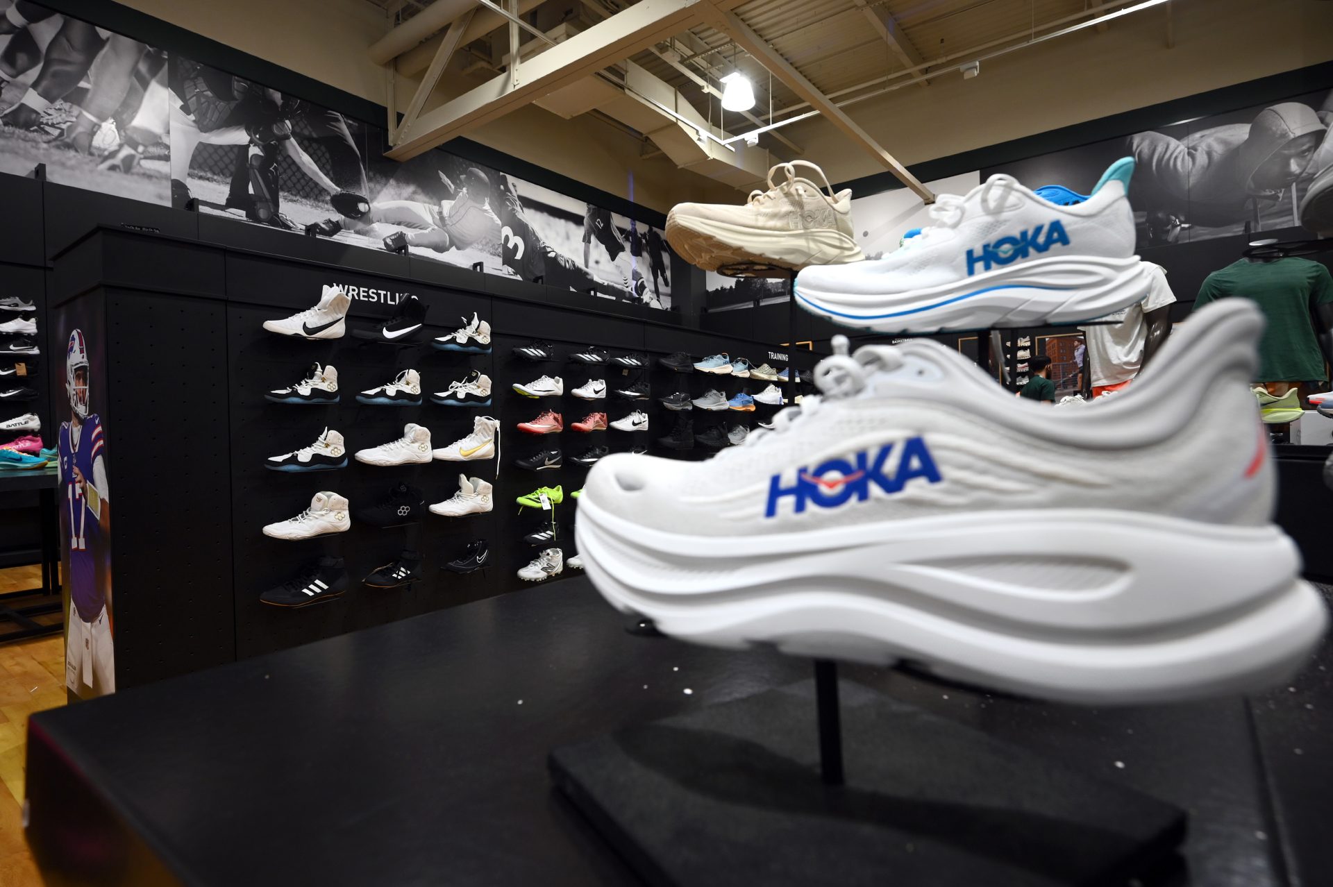 Sneakers of various brands on display at a Dick's Sporting Goods retail store, New York, NY, August 4, 2025. China, Vietnam and Indonesia are the top countries where shoes are manufactured and tariffs of a minimum of 19% for these three countries goes into effect next week.