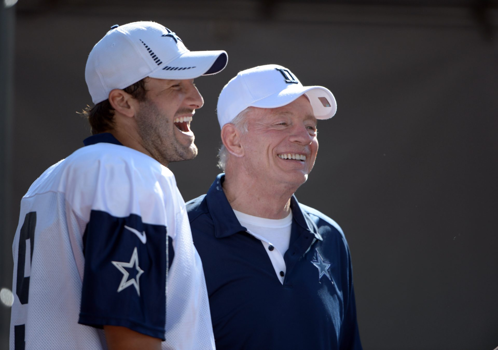 Aug 15, 2012; Oxnard, CA, USA; Dallas Cowboys owner Jerry Jones (right) and quarterback Tony Romo (9) at training camp at the River Ridge Fields.