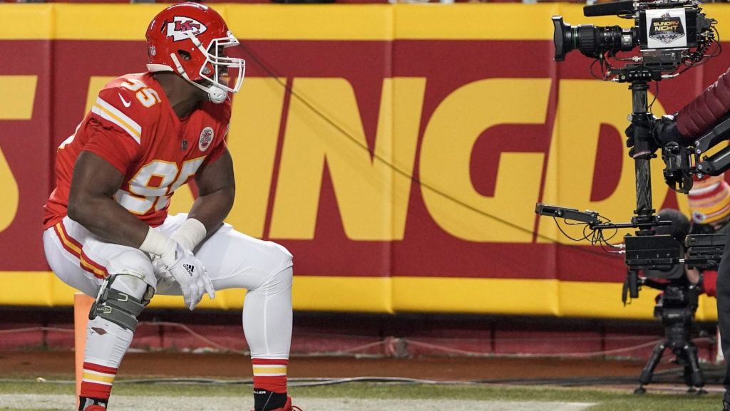 Jan 16, 2022; Kansas City, Missouri, USA; Kansas City Chiefs defensive end Chris Jones (95) celebrates toward the camera after a play against the Pittsburgh Steelers in an AFC Wild Card playoff football game at GEHA Field at Arrowhead Stadium. Mandatory Credit: Denny Medley-USA TODAY Sports