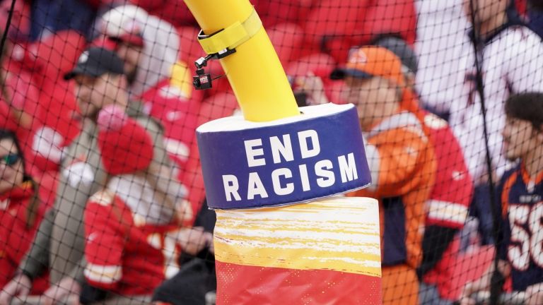 Jan 1, 2023; Kansas City, Missouri, USA; A general view of an End Racism sign on a goalpost prior to a game between the Kansas City Chiefs and Denver Broncos at GEHA Field at Arrowhead Stadium. Mandatory Credit: Denny Medley-USA TODAY Sports