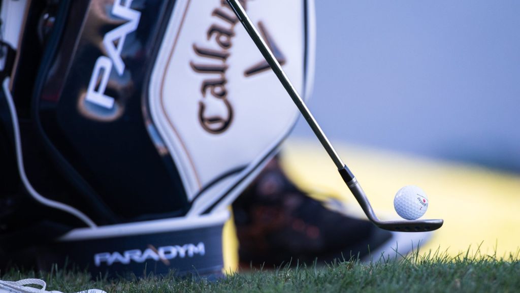 Adam Svensson balances a golf ball on his club while waiting to tee off from the 17th tee during the third round of the Honda Classic at PGA National Resort & Spa on Saturday, February 25, 2023, in Palm Beach Gardens, FL.