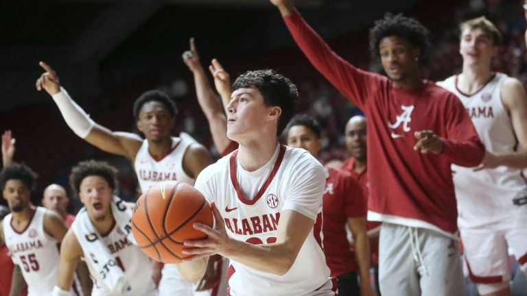 Nov 6, 2023; Tuscaloosa, Alabama, USA; Alabama guard Kai Spears (32) a walk on guard, takes a three late in the game at Coleman Coliseum. Mandatory Credit: Gary Cosby Jr.-USA TODAY Sports