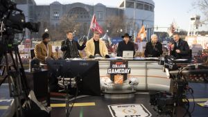 Dec 21, 2024; Columbus, Ohio, USA; ESPN cast, from left, Desmond Howard, Rece Davis, Pat McAfee, Nick Saban, Lee Corso and Kirk Herbstreit sit on the set of College GameDay prior to the College Football Playoff first round game between the Ohio State Buckeyes and Tennessee Volunteers in Columbus at Ohio Stadium. Mandatory Credit: Adam Cairns-Imagn Images via the USA Today Network