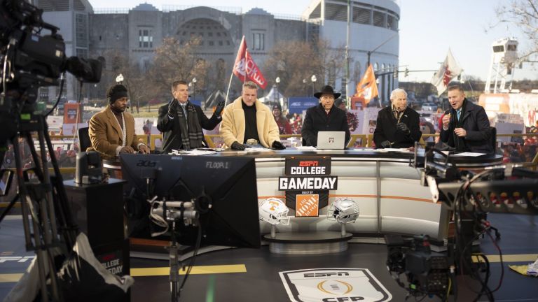 Dec 21, 2024; Columbus, Ohio, USA; ESPN cast, from left, Desmond Howard, Rece Davis, Pat McAfee, Nick Saban, Lee Corso and Kirk Herbstreit sit on the set of College GameDay prior to the College Football Playoff first round game between the Ohio State Buckeyes and Tennessee Volunteers in Columbus at Ohio Stadium. Mandatory Credit: Adam Cairns-Imagn Images via the USA Today Network