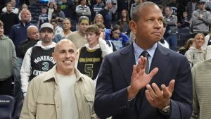 Mar 28, 2025; Minneapolis, Minnesota, USA; Minnesota Timberwolves minority owners Marc Lore and Alex Rodriguez celebrate the team's win over the Phoenix Suns at Target Center