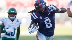 Dec 20, 2025; Oxford, MS, USA; Mississippi Rebels tight end Dae'Quan Wright (8) runs after the catch against the Tulane Green Wave during the first half of a game at Vaught-Hemingway Stadium
