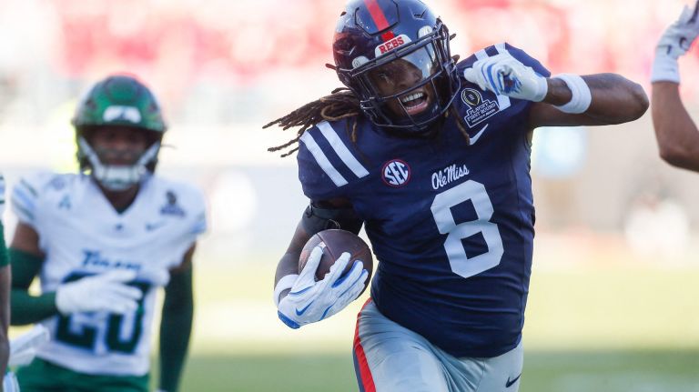 Dec 20, 2025; Oxford, MS, USA; Mississippi Rebels tight end Dae'Quan Wright (8) runs after the catch against the Tulane Green Wave during the first half of a game at Vaught-Hemingway Stadium