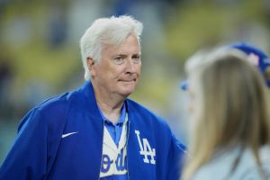 Mar 26, 2026; Los Angeles, California, USA; Los Angeles Dodgers owner and chairman Mark Walter walks on the field after the game against the Arizona Diamondbacks at Dodger Stadium.