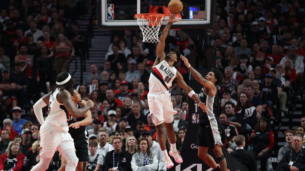 Apr 24, 2026; Portland, Oregon, USA; Portland Trail Blazers guard Scoot Henderson (00) shoots the ball over San Antonio Spurs guard Dylan Harper (2) during the second half during game three of the first round of the 2026 NBA Playoffs at Moda Center.