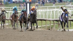 May 16, 2026; Laurel, MD, USA; Napoleon Solo (10) ridden by Paco Lopez leads Iron Honor (9) ridden by Flavien Prat, Chip Honcho (6) ridden by Jose Ortiz Jr., and Taj Mahal (1) ridden by Sheldon Russell down the stretch during the 151st Preakness Stakes at Laurel Park. Mandatory Credit: Amber Searls-Imagn Images