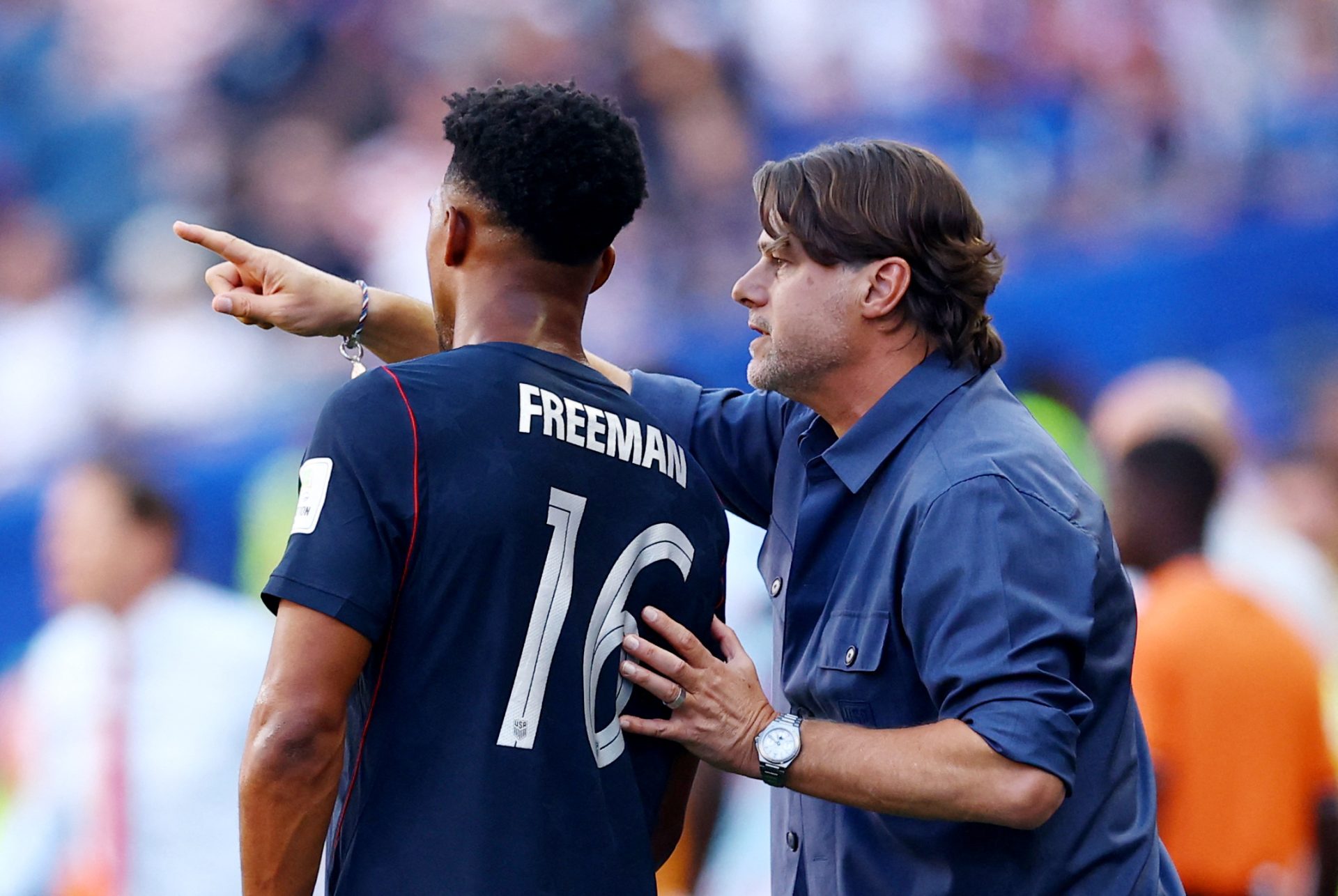 Soccer Football - FIFA World Cup 2026 - Round of 16 - United States v Belgium - Seattle Stadium, Seattle, Washington, U.S. - July 6, 2026 U.S. coach Mauricio Pochettino gives instructions to Alex Freeman
