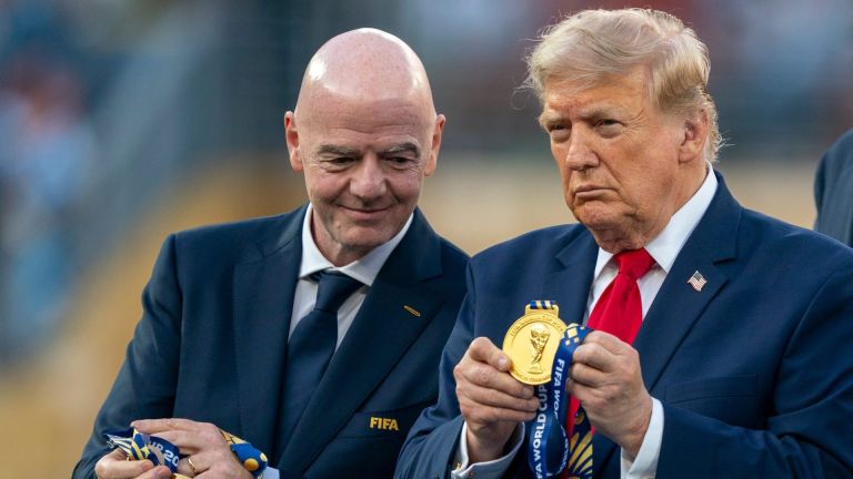 President Donald Trump and FIFA President Gianni Infantino hold World Cup medals during the FIFA World Cup 2026 final between Argentina and Spain at New York New Jersey Stadium on Sunday, July 19, 2026, in East Rutherford, NJ.