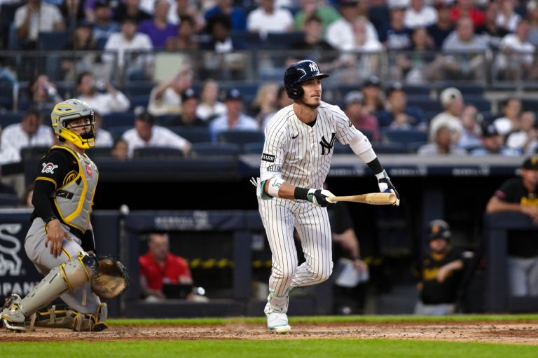 Jul 22, 2026; Bronx, New York, USA; New York Yankees left fielder Cody Bellinger (35) hits a double against the Pittsburgh Pirates during the fourth inning at Yankee Stadium