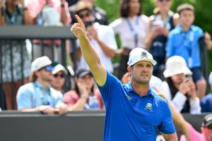 Aug 6, 2026; Bedminster, New Jersey, USA; Bryson DeChambeau points right after his tee shot on the first tee during the first round of the LIV Golf New York tournament at Trump National Bedminster.