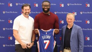 Aug 6, 2026; Camden, NJ, USA; From left to right Philadelphia 76ers general manager Mike Gansey and guard Jaylen Brown and managing partner Josh Harris pose for a photo during his introductory press conference at the Francis J. Myers Recreation Center. Mandatory Credit: Bill Streicher-Imagn Images