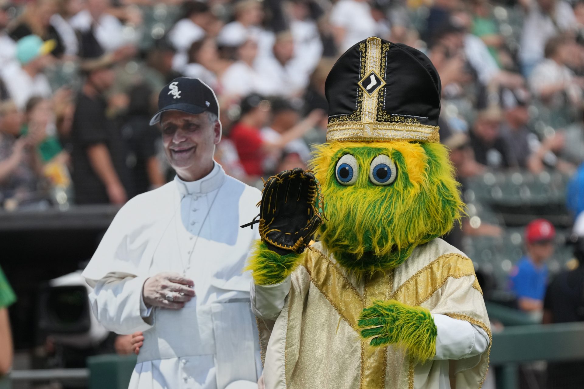 Aug 11, 2026; Chicago, Illinois, USA; Chicago White Sox mascot Southpaw wears a promotional Pope hat before a game between the Chicago White Sox and the Cincinnati Reds at Rate Field.