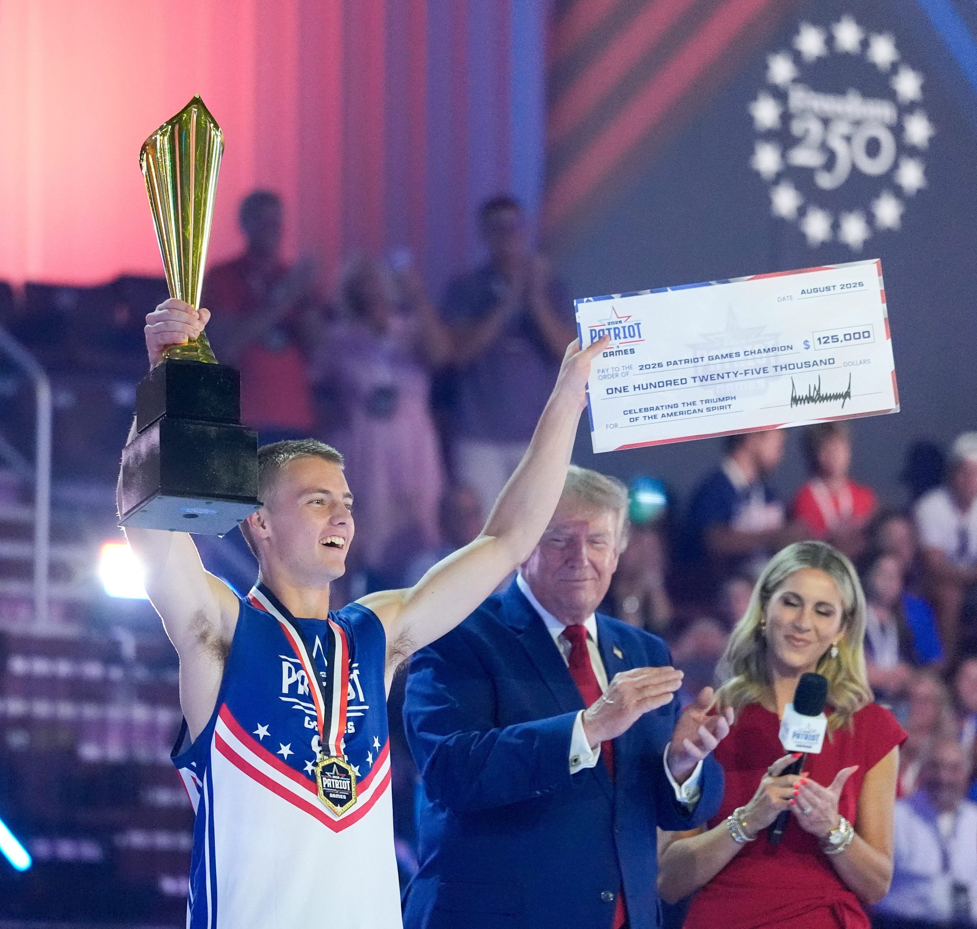 Rockwell Myers of Utah celebrates with his trophy and $125,000 scholarship after winning the Patriot Games held at SPIRE Academy, Aug. 11, 2026, in Geneva, Ohio.