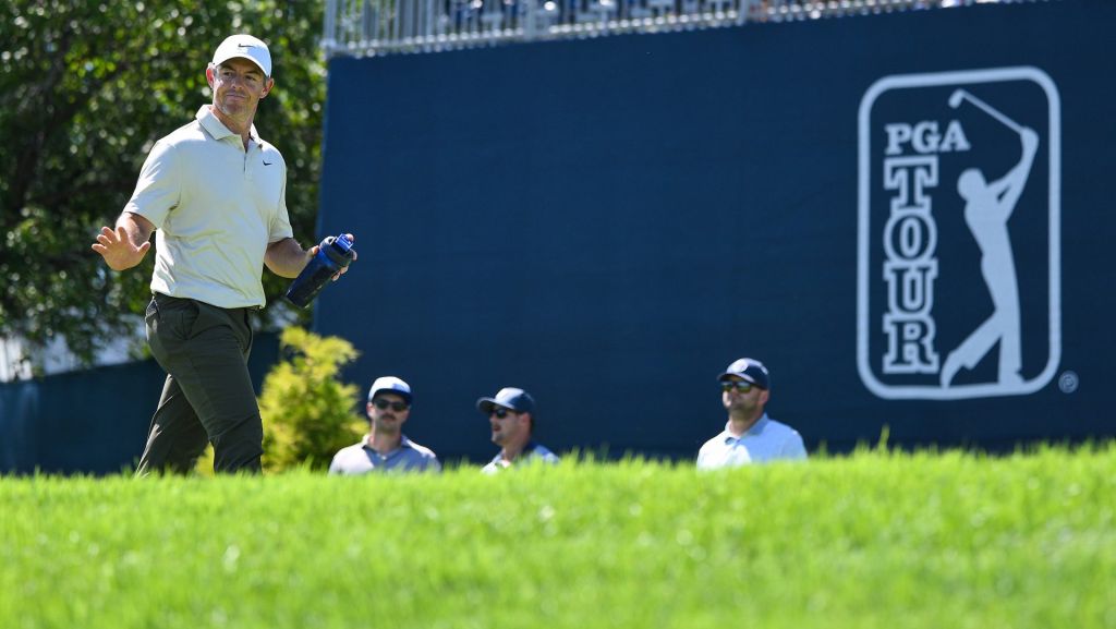 Aug 20, 2026; Saint Louis, Missouri, USA; Rory McIlroy waves to the crowd after playing his shot off of the twelfth tee during the first round of the BMW Championship golf tournament. Mandatory Credit: Jeff Curry-Imagn Images
