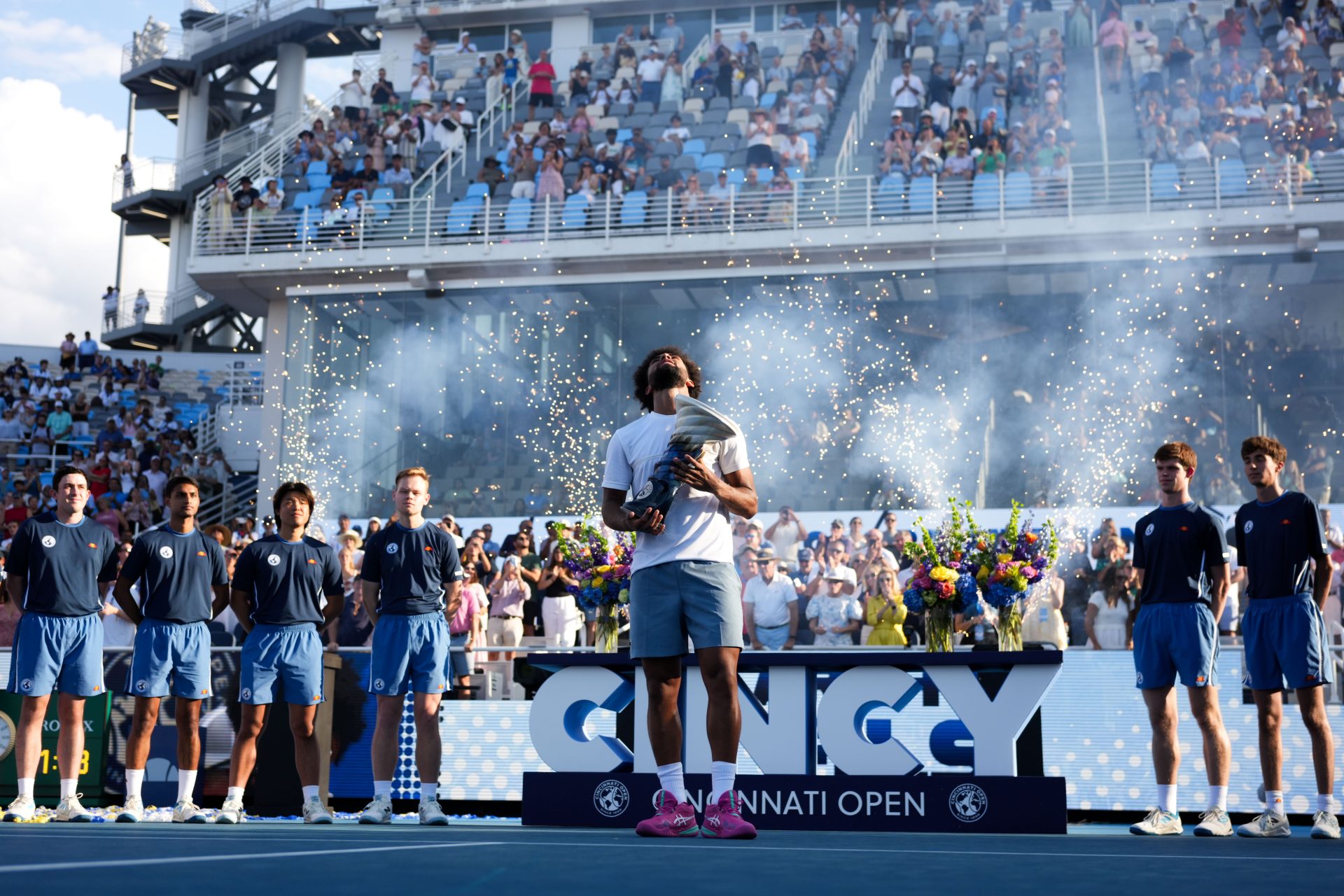 Aug 23, 2026; Cincinnati, OH, USA; Arthur Fils (FRA) celebrates with the Rookwood Cup after defeating Frances Tiafoe (USA) during the finals of the Cincinnati Open at Lindner Family Tennis Center.