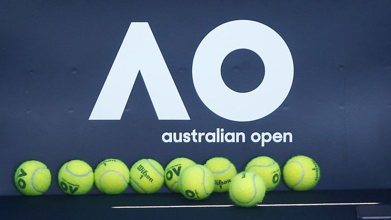 Tennis - Australian Open - Melbourne, Australia, January 14, 2018. Tennis balls are pictured in front of the Australian Open logo before the tennis tournament. REUTERS/Thomas Peter