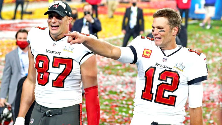 Feb 7, 2021; Tampa, FL, USA; Tampa Bay Buccaneers quarterback Tom Brady (12) and tight end Rob Gronkowski (87) celebrate after beating the Kansas City Chiefs in Super Bowl LV at Raymond James Stadium. Mandatory Credit: Mark J. Rebilas-USA TODAY Sports