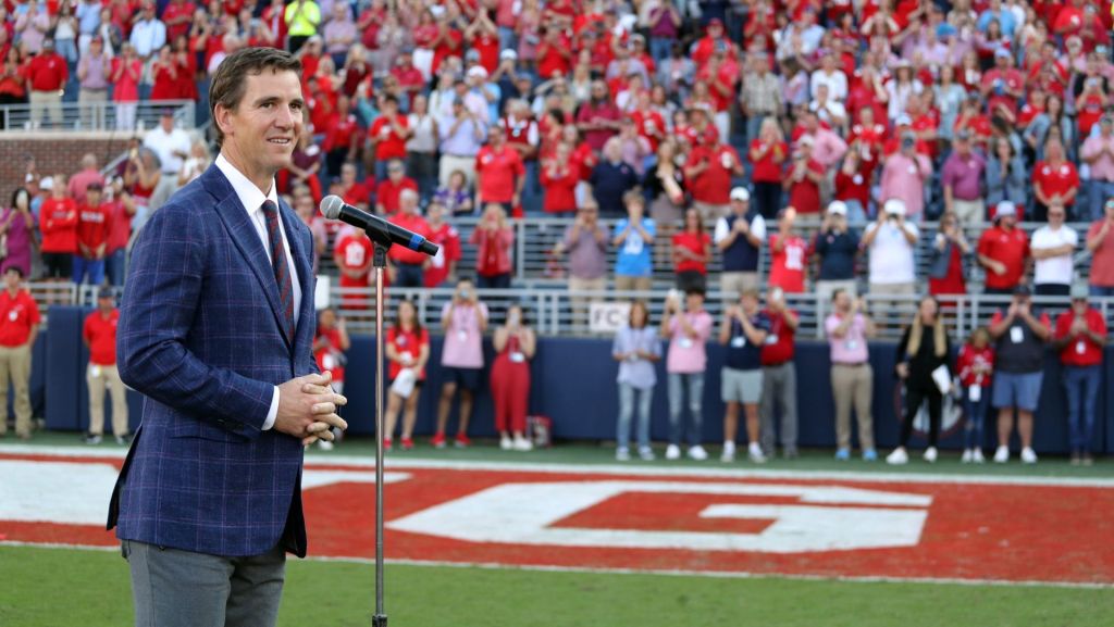Oct 23, 2021; Oxford, Mississippi, USA; Mississippi Rebels former quarterback Eli Manning speaks on what an honor it is to have his number 10 jersey retired at Mississippi during half time at Vaught-Hemingway Stadium. Mandatory Credit: Petre Thomas-USA TODAY Sports