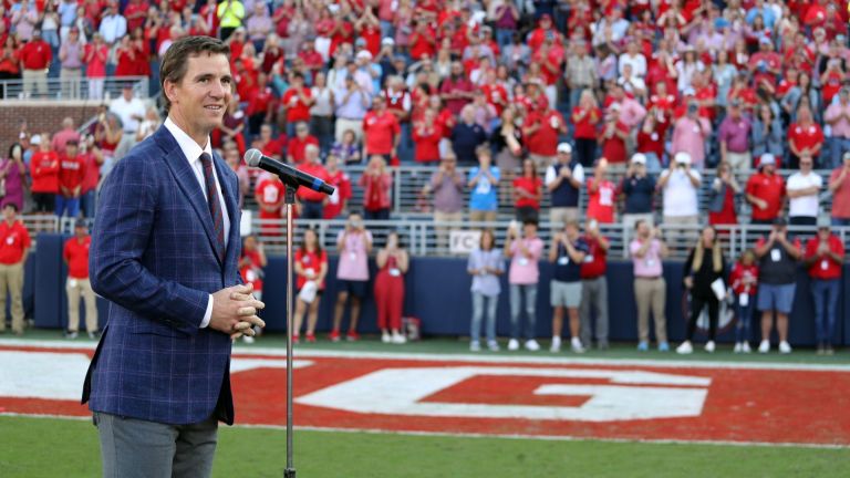 Oct 23, 2021; Oxford, Mississippi, USA; Mississippi Rebels former quarterback Eli Manning speaks on what an honor it is to have his number 10 jersey retired at Mississippi during half time at Vaught-Hemingway Stadium. Mandatory Credit: Petre Thomas-USA TODAY Sports