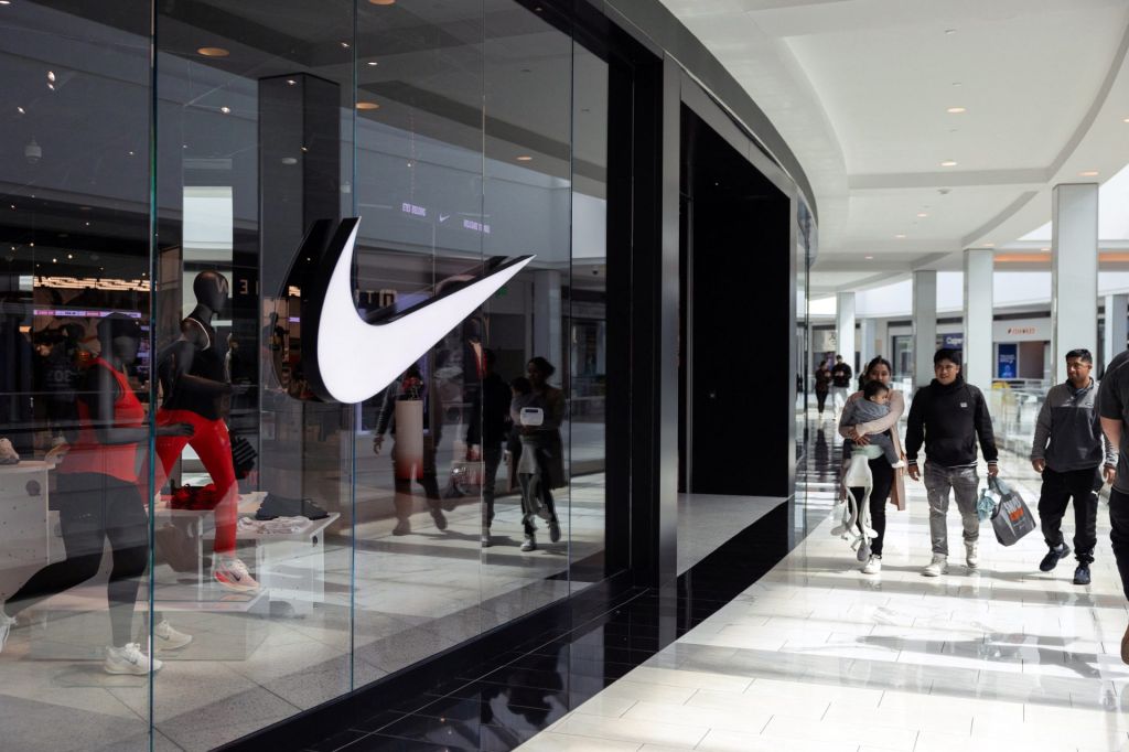 Shoppers walk past a Nike store in the King of Prussia Mall, as global markets brace for a hit to trade and growth caused by U.S. President Donald Trump's decision to impose import tariffs on dozens of countries, in King of Prussia, Pennsylvania, U.S., April 3, 2025.