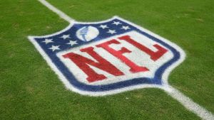 Nov 23, 2025; Paradise, Nevada, USA; The NFL shield logo on the field at Allegiant Stadium. Mandatory Credit: Kirby Lee-Imagn Images