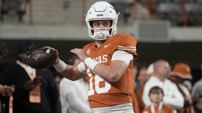 Nov 28, 2025; Austin, Texas, USA; Texas Longhorns quarterback Arch Manning warms up before a game against the Texas A&M Aggies at Darrell K Royal-Texas Memorial Stadium. Mandatory Credit: Scott Wachter-Imagn Images