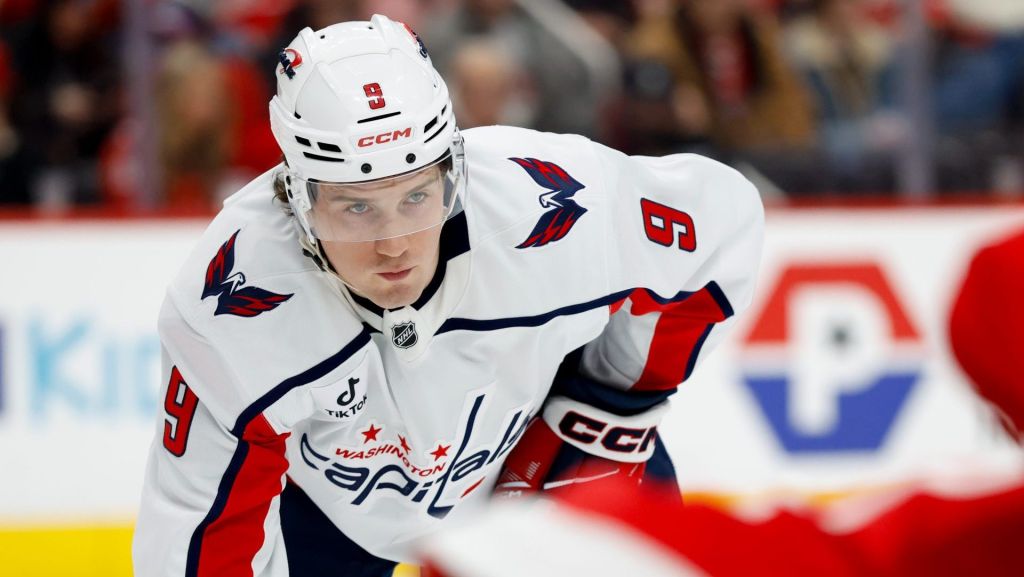 Jan 29, 2026; Detroit, Michigan, USA; Washington Capitals right wing Ryan Leonard (9) gets set during a face off in the first period against the Detroit Red Wings at Little Caesars Arena