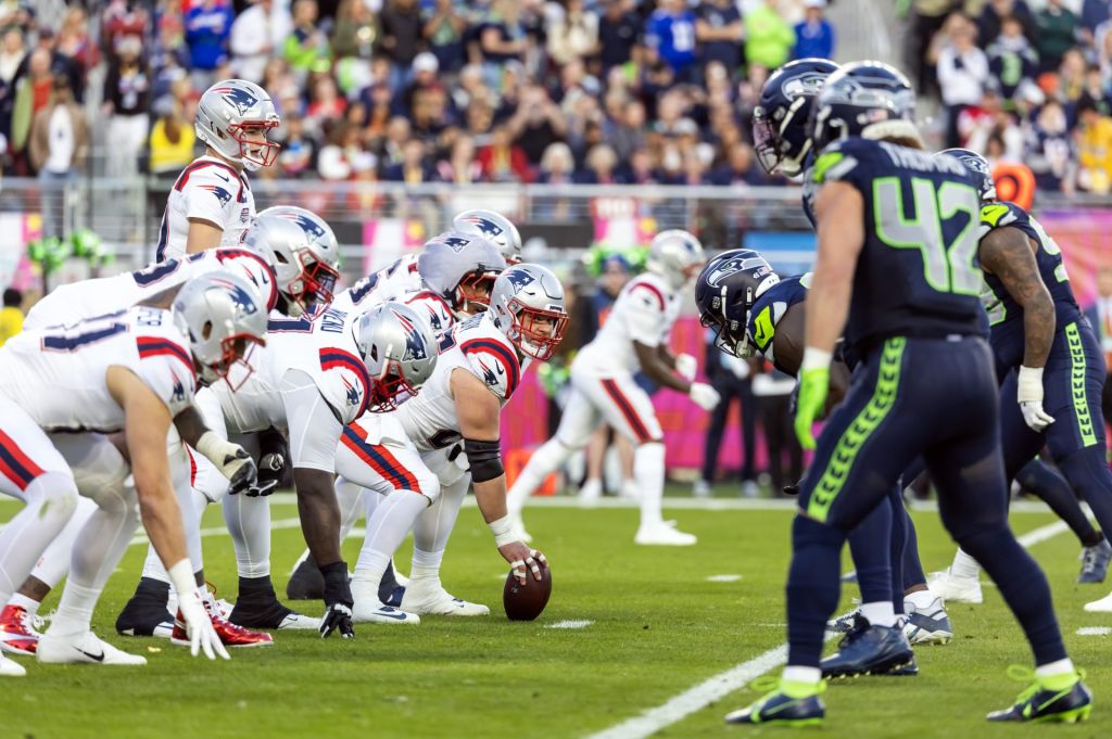 Feb 8, 2026; Santa Clara, CA, USA; New England Patriots center Garrett Bradbury (65) against the Seattle Seahawks during Super Bowl LX at Levi's Stadium.