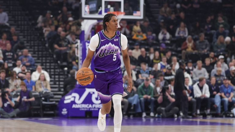 Apr 1, 2026; Salt Lake City, Utah, USA; Utah Jazz forward Cody Williams (5) brings the ball up the court against the Denver Nuggets during the first quarter at Delta Center.