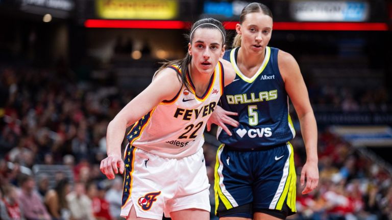 Apr 30, 2026; Indianapolis, IN, USA; Indiana Fever guard Caitlin Clark (22) and Dallas Wings guard Paige Bueckers (5) during an inbounds play in the first half at the Gainbridge Fieldhouse. Mandatory Credit: Trevor Ruszkowski-Imagn Images