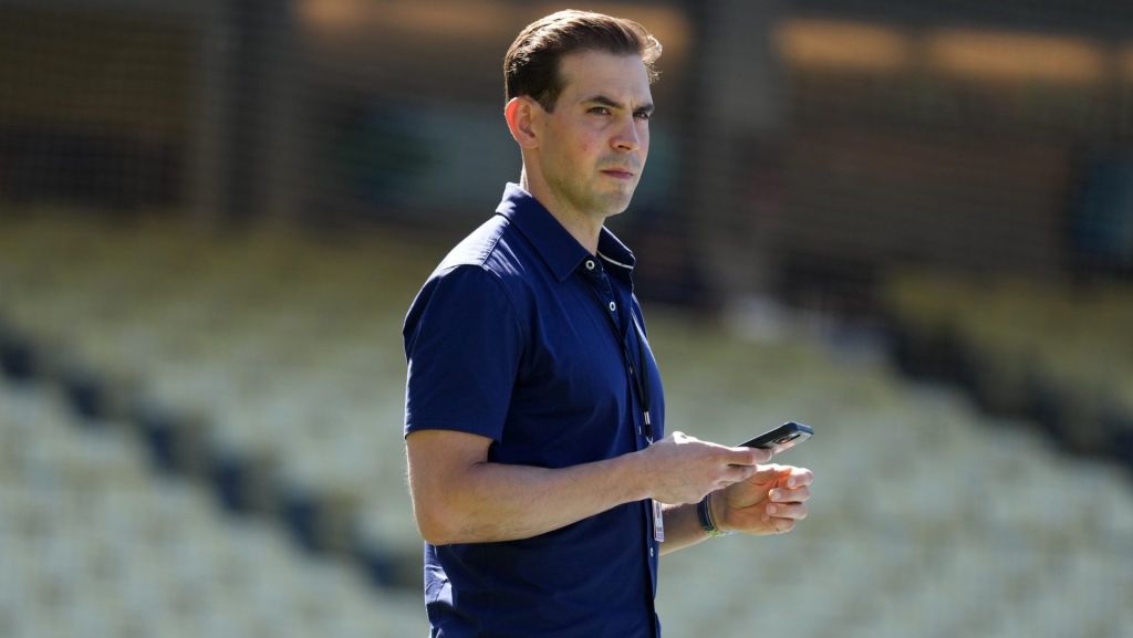 Jun 16, 2026; Los Angeles, California, USA; Spectrum SportsNet LA play-by-play announcer Joe Davis watches batting practice before the game between the Los Angeles Dodgers and the Tampa Bay Rays at Dodger Stadium. Mandatory Credit: Kirby Lee-Imagn Images