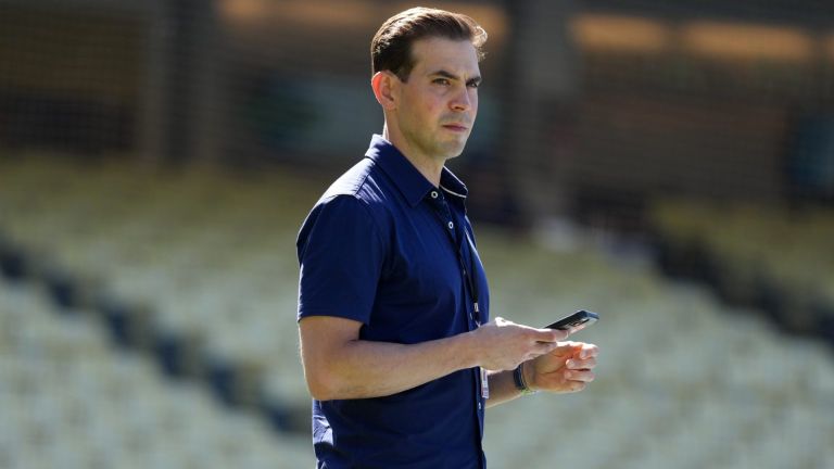 Jun 16, 2026; Los Angeles, California, USA; Spectrum SportsNet LA play-by-play announcer Joe Davis watches batting practice before the game between the Los Angeles Dodgers and the Tampa Bay Rays at Dodger Stadium. Mandatory Credit: Kirby Lee-Imagn Images
