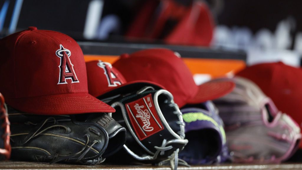Aug 8, 2026; Miami, Florida, USA; Los Angeles Angels hats and gloves sit in the dugout against the Miami Marlins during the fifth inning at loanDepot Park. Mandatory Credit: Rhona Wise-Imagn Images