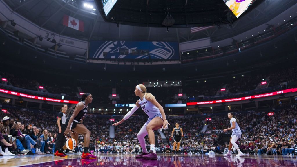 Aug 23, 2026; Vancouver, British Columbia, CAN; Toronto Tempo forward Isabelle Harrison (21) defends against Las Vegas Aces guard Jackie Young (0) in the second half at Rogers Arena. Mandatory Credit: Bob Frid-Imagn Images