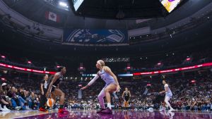 Aug 23, 2026; Vancouver, British Columbia, CAN; Toronto Tempo forward Isabelle Harrison (21) defends against Las Vegas Aces guard Jackie Young (0) in the second half at Rogers Arena. Mandatory Credit: Bob Frid-Imagn Images