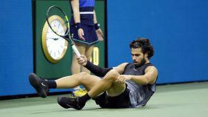 Tennis - U.S. Open - Flushing Meadows, New York, United States - September 9, 2026 Spain's Carlos Alcaraz fells during his quarter-final match against Ben Shelton of the U.S. REUTERS/Eduardo Munoz