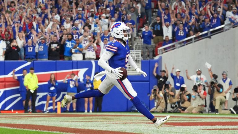 Sep 17, 2026; Orchard Park, New York, USA; Buffalo Bills wide receiver Joshua Palmer (5) runs to score a touchdown during the first half against the Detroit Lions at New Highmark Stadium. Mandatory Credit: Gregory Fisher-Imagn Images