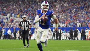 Sep 17, 2026; Orchard Park, New York, USA; Buffalo Bills quarterback Josh Allen (17) runs to score a touchdown against the Detroit Lions during the second half at New Highmark Stadium. Mandatory Credit: Gregory Fisher-Imagn Images