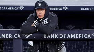 Sep 22, 2026; Bronx, New York, USA; New York Yankees injured right fielder Aaron Judge (99) watches from the dugout during the third inning against the Tampa Bay Rays at Yankee Stadium. Mandatory Credit: Brad Penner-Imagn Images