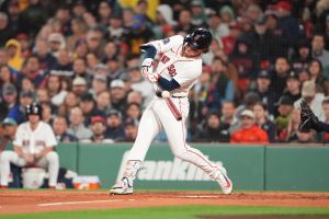 Sep 23, 2026; Boston, Massachusetts, USA; Boston Red Sox left fielder Roman Anthony (19) hits a single against the Cleveland Guardians during the third inning at Fenway Park.