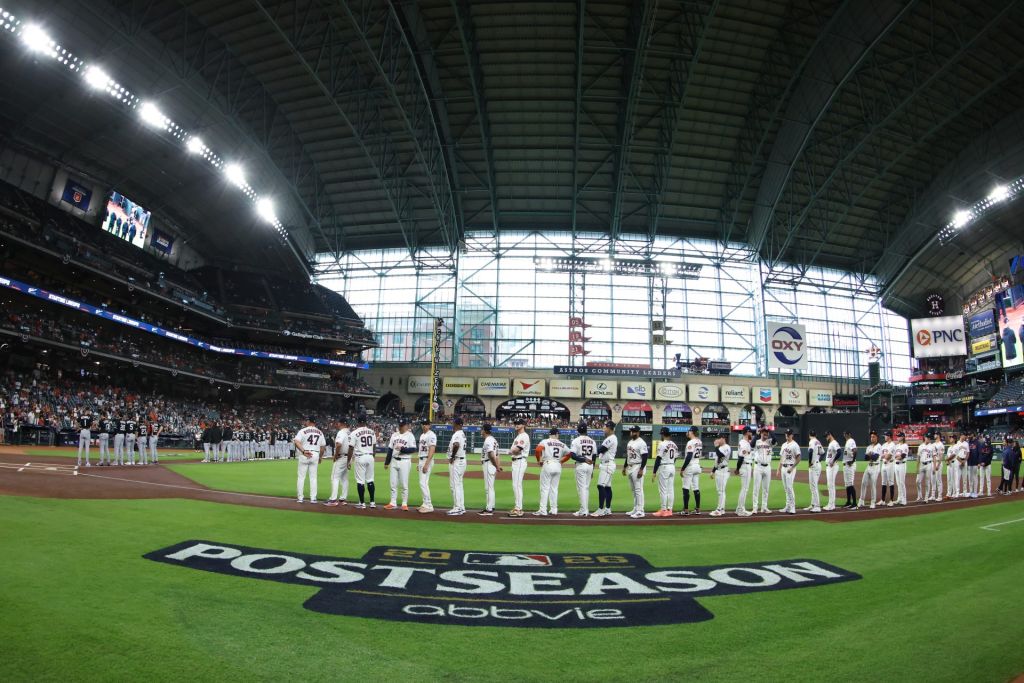 Sep 29, 2026; Houston, Texas, USA; The Houston Astros line up for the beginning of the game against the Chicago White Sox during game one of the Wildcard round for the 2026 MLB Playoffs at Daikin Park.