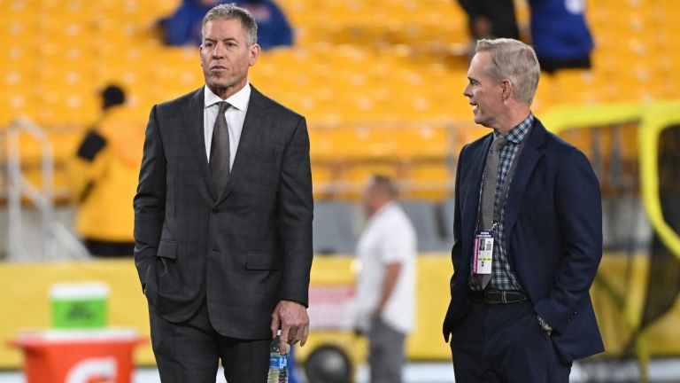 Oct 28, 2024; Pittsburgh, Pennsylvania, USA; Hall of Fame quterback Troy Aikman stands with his Monday Night Football Broadcast announcer Joe Buck before a game between the Pittsburgh Steelers and New York Giants at Acrisure Stadium. Mandatory Credit: Barry Reeger-Imagn Images