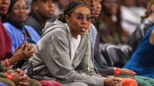 Aug 3, 2025; College Park, Georgia, USA; Atlanta Dream partner Renee Montgomery watches a game against the Washington Mystics in the second quarter at Gateway Center Arena at College Park. Mandatory Credit: Brett Davis-Imagn Images
