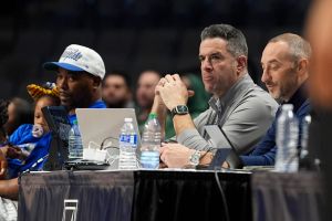 American Conference Commissioner Tim Pernetti watches during the first round American Conference Tournament game between Memphis and Tulane in Birmingham, Ala, on March 11, 2026.